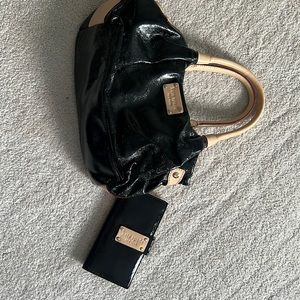 Small under the arm Kate Spade purse and wallet